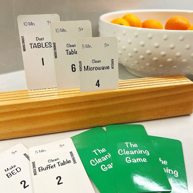 Cards are marked with expected cleaning time, age range (e.g., "3+" means 3 and up), and optimal sequence to clean.